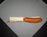 A picture of step 2 of Easy Spring Rolls with Cheese and Wieners.