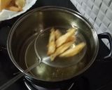 A picture of step 6 of Crispy honey chilli potato.