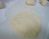 A picture of step 6 of Steamed Meat Buns in a Frying Pan.