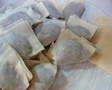 A picture of step 2 of Fried Wonton Dumplings with Chrysanthemum Leaves Seasoned with Yuzu Pepper Paste.