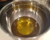 A picture of step 17 of Garlic Chips and Garlic Oil.