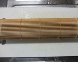 A picture of step 8 of Salad Rolls My Way of Rolling and Cutting.