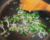 A picture of step 2 of Onigiri (Rice Balls) with Shirasu and Green Onions Stir-Fried in Sesame Oil.
