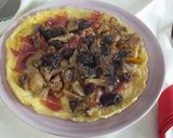 Foto del paso 3 de la receta Tortilla abierta con setas y pasas