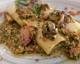 Foto del paso 9 de la receta Puerros confitados con panceta y pesto de rúcula y pistachos