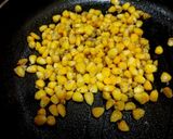 A picture of step 3 of Cheese butter corn.