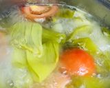 Hình bước làm 2 của món Canh Cải Chua Nấu Xương