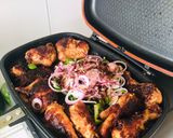 A picture of step 4 of Grilled chicken thighs and breasts.
