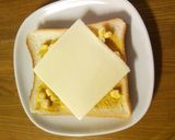 A picture of step 3 of For Breakfast: Curry, Mayonnaise and Corn on Toast.