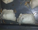 A picture of step 8 of Cheesy beef bacon explosion.