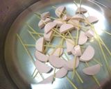 A picture of step 2 of Easy To Eat Fish Sausage and Pasta Soup.