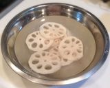 A picture of step 1 of Lotus Root Millfeuille with Garlic and Anchovy.