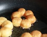 A picture of step 10 of Chewy and Moist "Pon-de-Ring" Doughnuts.