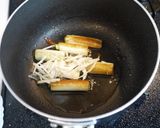 A picture of step 3 of Warm Your Body! Seared Japanese Leek and Ginger Soup.