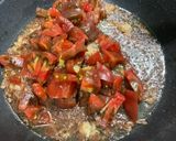 Une image de l'étape 8 de Tagliatelles vertes aux anchois, ail, tomates et persil.