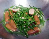A picture of step 5 of Sausage And Chives With Garlic.
