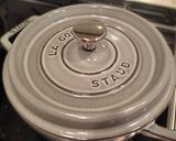 A picture of step 3 of Baked Sweet Potatoes in a Staub Cast Iron Pan.