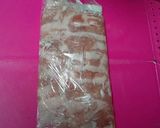 A picture of step 4 of Layered Pork "Steak" with Cheese using Thinly Sliced Pork Offcuts.