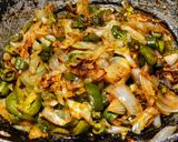 A picture of step 8 of Triple Schezwan fried rice.