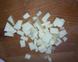 Foto del passaggio 4 della ricetta Risotto alla crema di porro, formaggio di montagna e pepe