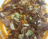 Foto del paso 10 de la receta: Oreja de cerdo sobre brava y cebollita japonesa