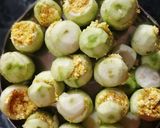 A picture of step 7 of Tinde(apple gaurd)with paneer stuffing.