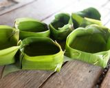 A picture of step 3 of Ook Kai / kai Paam / Baked Eggs in Banana Leaves.