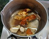A picture of step 2 of Grapefruit Peels and Palm Jaggery Tea.