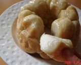 A picture of step 11 of Banana Yogurt Monkey Bread.