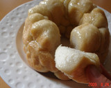 A picture of step 11 of Banana Yogurt Monkey Bread.