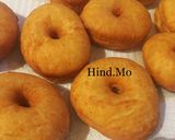 A picture of step 9 of American Yeast Donuts.