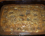 A picture of step 10 of Cinnamon Roll Poke Cake.