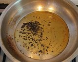 A picture of step 5 of Katla fish curry with raw mango.