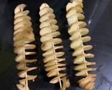A picture of step 3 of Potato spirals.