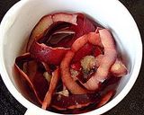 A picture of step 4 of Pink Hued Apple Jam using Red Gold Apples.