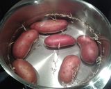 A picture of step 1 of Warm potato and chard salad.