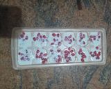 A picture of step 3 of Frozen pomegranate bites.