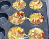 A picture of step 6 of Egg, mushroom & halloumi “breakfast muffins”.