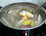 A picture of step 1 of LG BUTTON MUSHROOM IN CHICKEN SOUP( ALL IN A POT ).