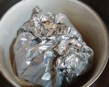 A picture of step 2 of Steamed Garlic Chicken With Fried Ginger Sprinkle.