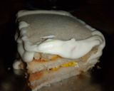A picture of step 11 of Peri Patakha Chicken Sandwich Cake.