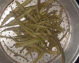 A picture of step 1 of Cluster Bean Pickle.