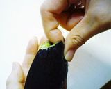 A picture of step 5 of How to Neatly Peel an Avocado.