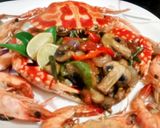 A picture of step 4 of Spicy hot fried Crab & Prawns in mushrooms.