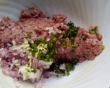 A picture of step 2 of Meat balls and beef sausages bitings in sauce.