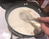 A picture of step 5 of White sauce cheesy chicken casserole.
