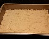 A picture of step 4 of Toasted Coconut Caramel Cashew Bars.