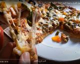صورة لخطوة 5 من وصفة البيتزا على اصولها بعجينه مناسبه لكافة انواع المعجنات