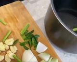A picture of step 2 of Oxtail Soup Thai style with Herbs.