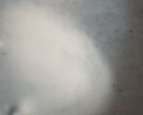A picture of step 3 of Liquid dough Roll pati/samosa pati.